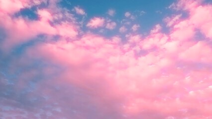 abstract gradient pink glowing sky background with clouds