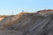 sunset in a gravel pit with an off-road surface on a beautiful autumn day