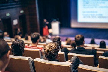 Wall Mural - Woman giving presentation on business conference event.