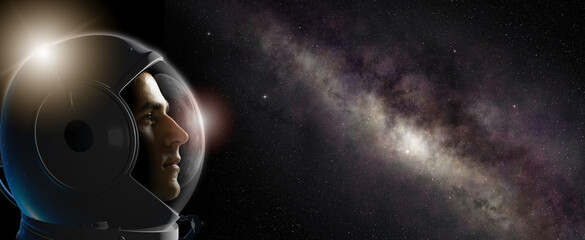 Wall Mural - head shot of astronaut wearing a helmet in outer space looking at the milky way. concept of space tr