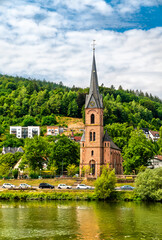 Wall Mural - Evangelical church at the Neckar river in Hirschhorn, Germany