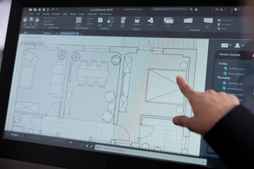 Poster - Room floor planner software close up, real estate studio project, interior design 2d creator app on computer screen. Apartment wireframes, woman pointing with finger on draft on monitor
