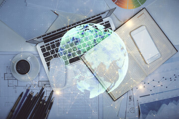Poster - Social network hologram drawings over computer on the desktop background. Top view. Multi exposure. Concept of people connection.