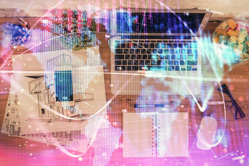 Poster - Business theme hologram drawings over computer on the desktop background. Top view. Multi exposure. Concept of international connections.