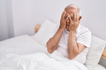 Sticker - Senior grey-haired man  at bedroom