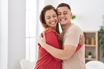 Sticker - Man and woman mother and son hugging each other at home