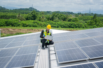 Poster - Technician installing the solar panels at roof top,Technician checking Solar panel.