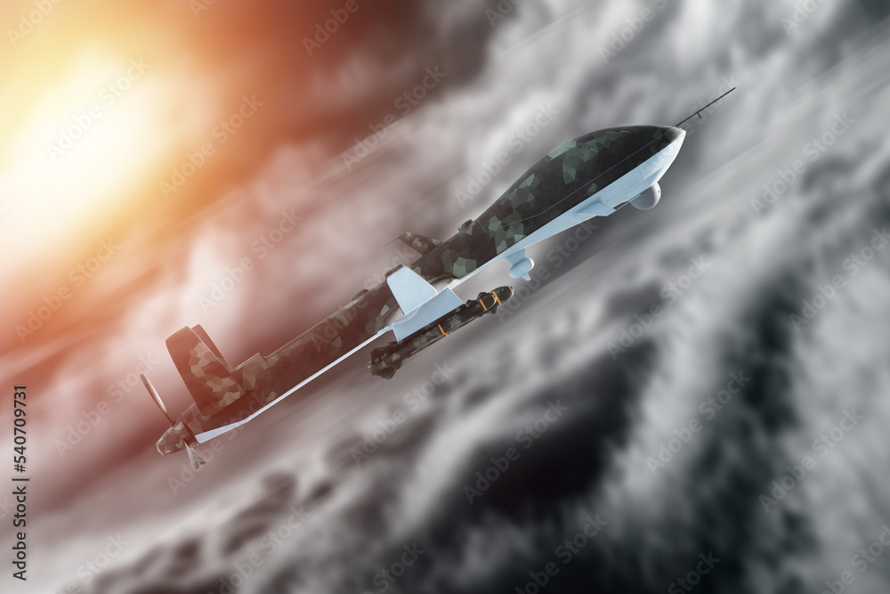 A military combat drone UAV is on duty in the sky. Modern aircraft ...