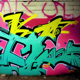 Fototapeta Młodzieżowe - Colorful Beautiful Graffiti On Old City Walls. Creative Abstract Background.
