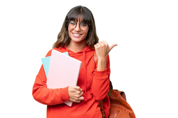 Wall Mural - Young student caucasian woman over isolated background pointing to the side to present a product