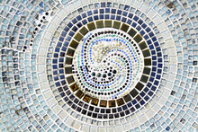 Colorful Of Mosaic Tile Floor For Background. Art Design Wallpaper, Cracked, Shape Or Circle Or Round And Abstract. Blue, Gray Or Grey, Black, White And Brown And Blue Tile Fragments On Wall.