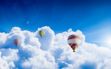 Wall Mural - hot air balloons fly in blue sky with white clouds and moon, sunny weather