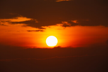 Wall Mural - the bright sun shining on the sky and clouds the time in the evening