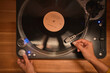 © ADDICTIVE STOCK - Crop person playing music on vintage record player