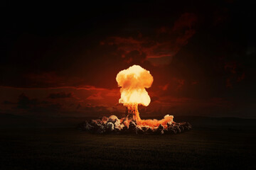 Wall Mural - Terrible bright nuclear explosion in the evening field. World war 3. Apocalypse, creative idea. Concept of nuclear catastrophe. H-bomb danger. Radiation and explosion. Nuclear mushroom