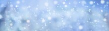 Blue Winter Background With Snow Texture And Falling Snowflakes - Cold Sunny Winter Landscape In Christmas Season - Panorama With Space