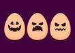 © Supakorn - Halloween face on the brown egg vector on purple background. Halloween minimal concept.