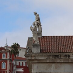 Wall Mural - statues on the roof in Lisbon 