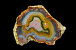 A cross section of the agate stone. Multicolored agate with a unique contrasting pattern and pseudomorphosis. Origin: Morocco, High Atlas area around Aquim.
