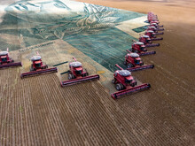 Mass Soybean Harvesting At A Farm In Mato Grosso State,Brazil. Concept Brazilian Real Bank Note Wirh Agribusiness. And Commodities.