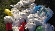 Old Used Nappy Thrown Into Garbage And Landfill, Raw Fecal Matter. Environmental Pollution By Disposable Hygiene Products
