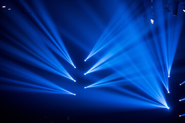 Wall Mural - colorful stage spotlights with laser radiation
