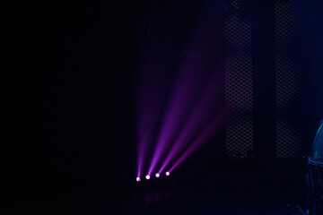 Wall Mural - colorful stage spotlights with laser radiation