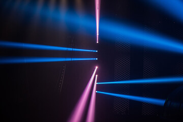Wall Mural - colorful stage spotlights with laser radiation