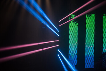 Wall Mural - colorful stage spotlights with laser radiation