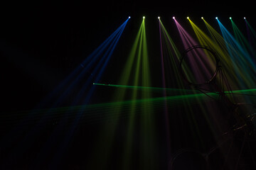 Wall Mural - colorful stage spotlights with laser radiation