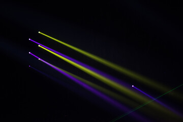 Wall Mural - colorful stage spotlights with laser radiation