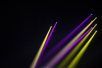 Wall Mural - colorful stage spotlights with laser radiation