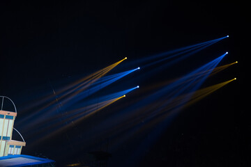 Wall Mural - colorful stage spotlights with laser radiation