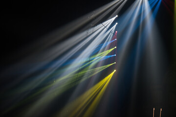 Wall Mural - colorful stage spotlights with laser radiation