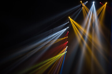 Wall Mural - colorful stage spotlights with laser radiation