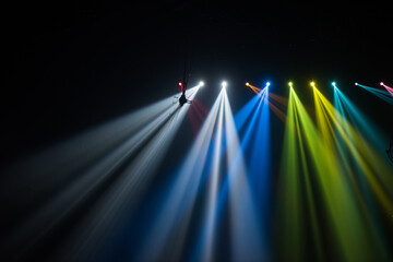 Wall Mural - colorful stage spotlights with laser radiation