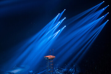 Wall Mural - colorful stage spotlights with laser radiation