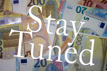 Poster - Stay Tuned word with money. Paper currency background with different banknotes.
