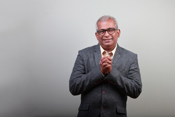 Wall Mural - Portrait of a senior man of Indian ethnicity with a smiling face