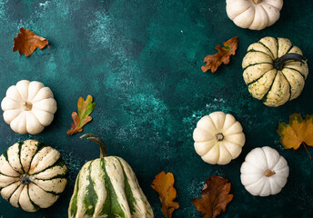 Wall Mural - Autumn fall background with pumpkins