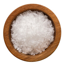 Sea Salt Flakes In A Wood Bowl Isolated From Above.