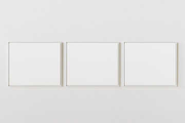 Wall Mural - Group of three empty picture frames hanging on white wall at same height. Template for your content. 3D illustration.