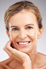 Wall Mural - Skincare, face and portrait of senior woman in studio with beauty, cosmetic and health routine. Happy, smile and elderly lady with wrinkles isolated by gray background with wellness anti aging facial