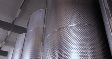 Large Metal Vats Ferment Wine Or Beer At Winery
