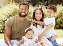 Family, Portrait And Picnic In A Park With Happy, Relax And Smile People Bond On A Blanket Outdoors. Black Family, Kids And Parents Relaxing On Grass In The Yard, Enjoying Summer With Baby And Son