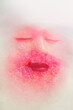 Attracting lips, are intensifying the red color tones, while a rose buds texture shows through a doupble exposure effect.
