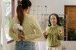 © NanSan - Daughter flowers giving mature mother for love mother day concept.