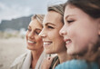 © Allistair F/peopleimages.com - Happy family, travel and girl, mother and grandma bonding on a beach in mexico, happy and relax while smiling on vacation. Love, family and generations with face of ladies enjoy ocean view together