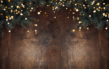 spruce branch on a wooden background