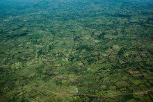 An Aerial View Over The Grassy Plains Of Southern Kenya.